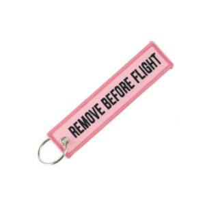 Roze sleutelhanger remove before flight